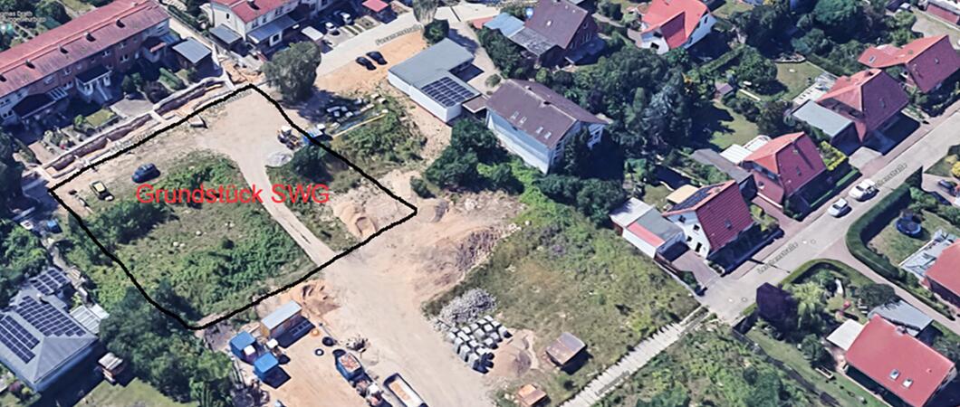 Zwei zweigeschossige Flachdachgebäude mit jeweils fünf Wohnungen (o. r.) und Stellplätzen errichtet die SWG in Neumühle zwischen Fasanen- und Lerchenstraße.